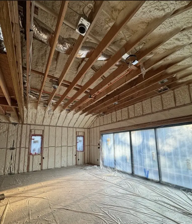 Interior walls and ceiling insulated with spray foam during new construction in Godfrey